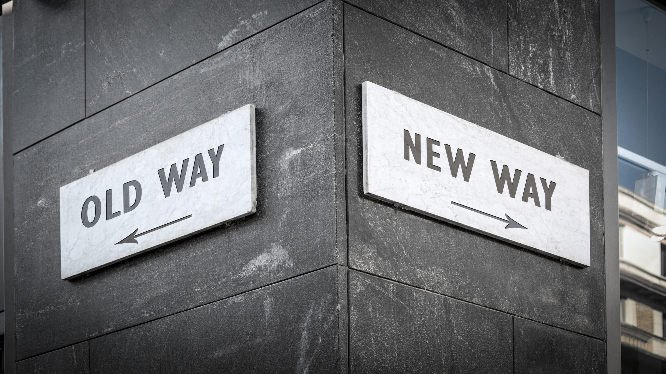 Image showing two road signs. One shows "new way". The other shows "old way"